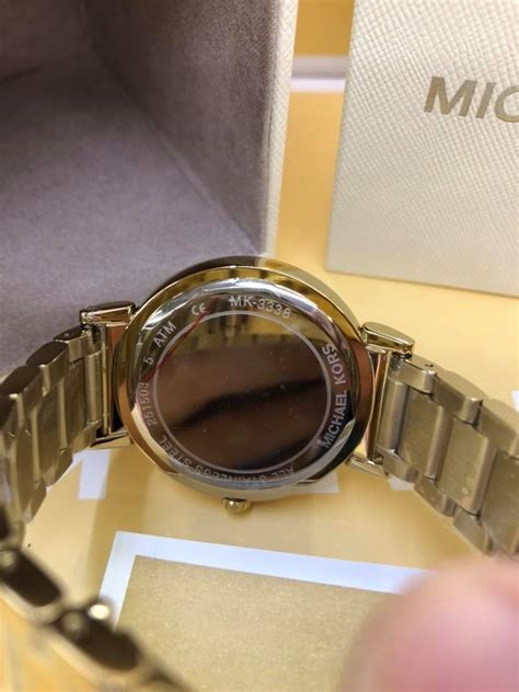 check michael kors watch serial number - Michael Kors Watch authenticity check.